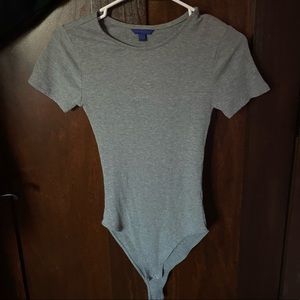 Never worn Aeropostale Grey Bodysuit. Size Small.